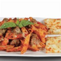 Penne Sausage Marinara Pasta · Penne rigati and italian sausage, tossed in our homemade red tomato sauce and topped with mo...