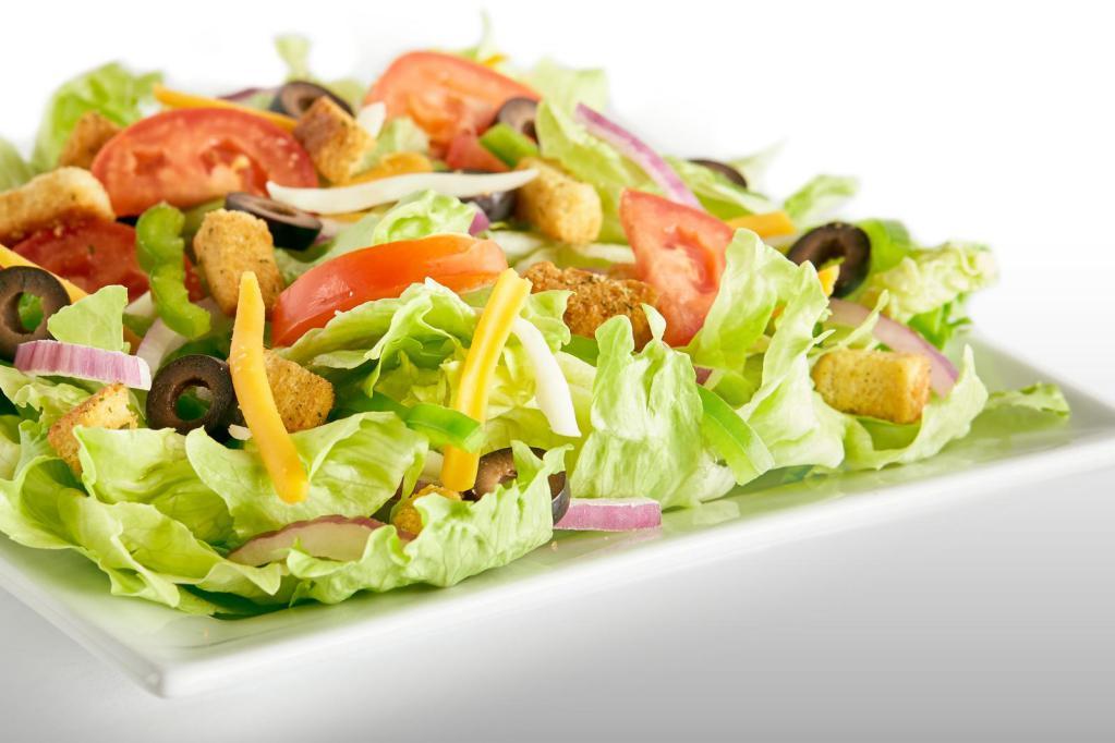 Garden Salad · Iceberg lettuce, bell peppers, red onions, black olives, fresh roma tomatoes, mozzarella cheese, cheddar cheese, seasoned croutons, and your choice of dressing.