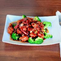 F03. General Tso's Chicken · The general favorite dish. Tender of boneless chicken marinated in red hot sauce. Served wit...