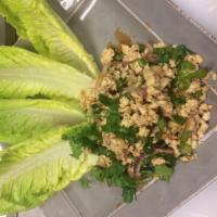 5B. Chicken Lettuce Wrap · Larb gai (Thai chicken salad) served with fresh lettuce.