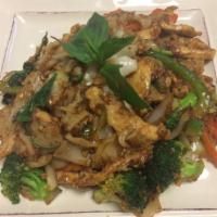 33. Pad Kee-Mao · Stir-fry wide rice noodles with your choice of meat, cabbage broccoli, carrot, bell peppers,...