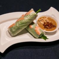 2 Piece Green Paradise Spring Roll · Prawn and pork rolled in rice wrapper with mint and chive, served with peanut sauce.