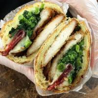 The Guido · Choice of chicken with hot cappicola, sauteed broccoli rabe in garlic and oil and melted Asi...