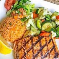 Grilled Salmon · Fresh grilled wild salmon served with rice and vegetables.