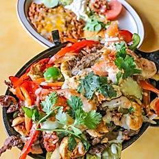 Cabrera's Famous Fajitas · Steak, Chicken or shrimp mixed with bell peppers, onion, tomato, grilled cactus and cheese; flamed with white wine and served with rice, beans, pico de gallo, guacamole and sour cream.