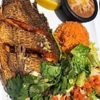 Mojarra Estilo Cabrera's · Fried tilapia enhanced with butter, fresh garlic and spices. Served with rice and beans.