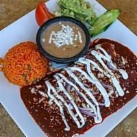 Mole Sauce Enchiladas · 2 corn tortillas filled with charbroiled chicken simmered in our traditional sweet and spicy...