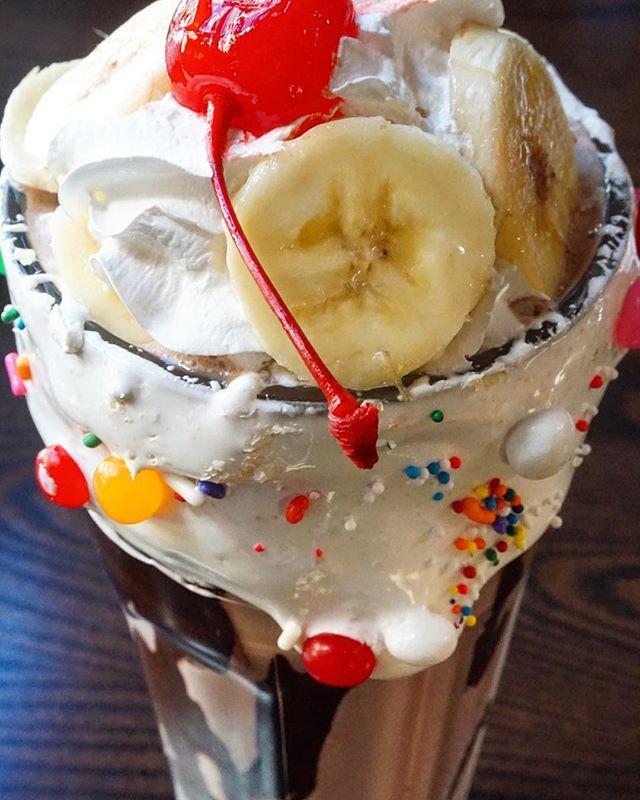 Banana Split Milkshake · Chocolate and strawberry ice cream, banana, whipped cream topped with a cherry.