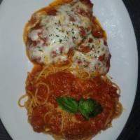 Chicken Parmigiana with salad and garlic roll · Breaded chicken breast served in tomato sauce, topped with melted mozzarella and a side of s...
