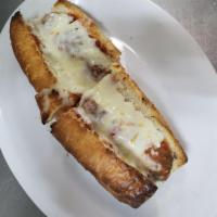 Sausage and Pepper Parmigiana Sub · French bread, green bell peppers, Italian sausage, mozzarella cheese, Parmigiana cheese and ...