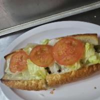 Cappicolla and Provolone Cold Sub · French bread, capicola, provolone cheese, lettuce, tomatoes, black olives, red onions served...