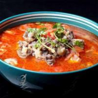 Stewed Ox Tails with Tomatos · 