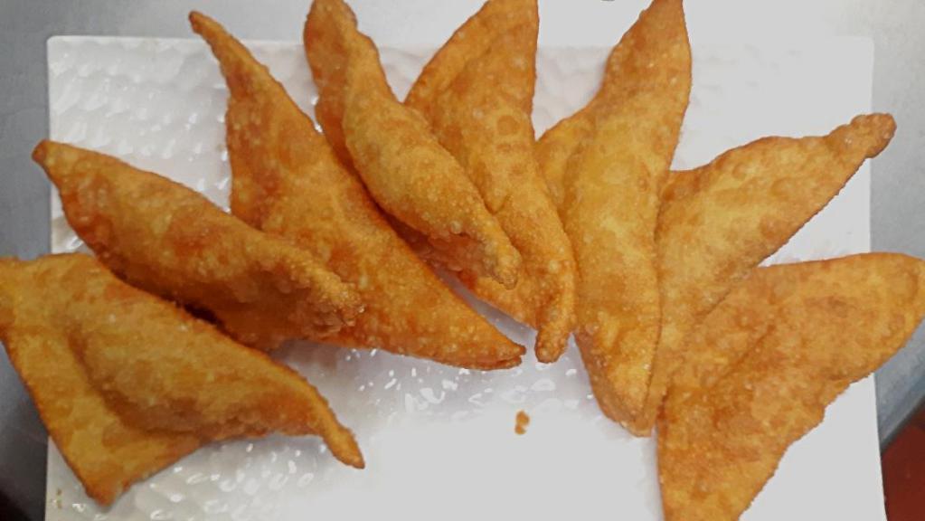 4. Fried Crab Cheese Puffs · Curry filling. Eight pieces.