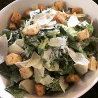 Kicked Up Kale Caesar Salad · Romaine hearts, kale, shaved parmesan with homemade garlic and rosemary croutons, tossed in ...
