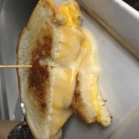 Original Grilled Cheese · White cheddar, american, monterey jack and a touch of cream cheese on sourdough.