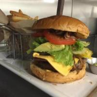 Prime Angus Burger*Temproary Price Increase Due to Meat Supply Shortage* · 1/2 lb. prime Angus beef patty, lettuce, tomato, onion, pickle and mayo.