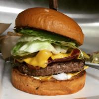 Club Cheeseburger*Temproary Price Increase Due to Meat Supply Shortage* · 1/2 lb. prime Angus beef patty, bacon, american cheese, avocado, lettuce, tomato, onion, pic...