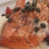 Broiled Atlantic Salmon · Fresh Atlantic salmon, roasted vegetables, and twice baked potato topped with capers and lem...