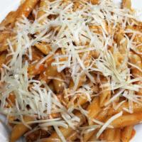 Penne alla Vodka · Penne in a garlic cream tomato vodka sauce topped with parmesan cheese.