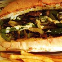 Philly Cheese Steak Sub · Steak, onions, green peppers, mushrooms, mozzarella cheese. Served with choice of side.