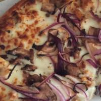 Ranch Chicken Pizza · Juicy baked chicken, ranch dressing, mozzarella cheese, red onions and fresh mushrooms.