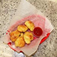 Garlic Knots · 5 pieces. Served with small sauce.
