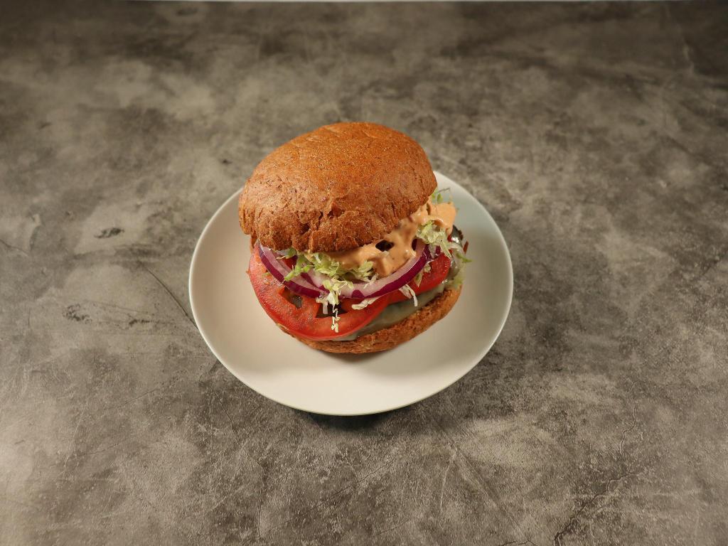 19. Black Bean Burger · Homemade black bean burger, melted provolone, fresh tomato slices, red onion, lettuce with chipotle mayo on a multi grain bun.