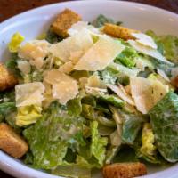 Caesar Salad · Romaine lettuce with Caesar dressing, croutons and Parmesan cheese.