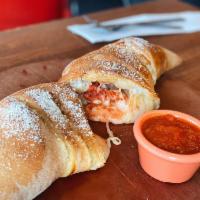 Make Your Own Calzone · Marinara sauce, ricotta cheese and your choice of any 3 toppings.
