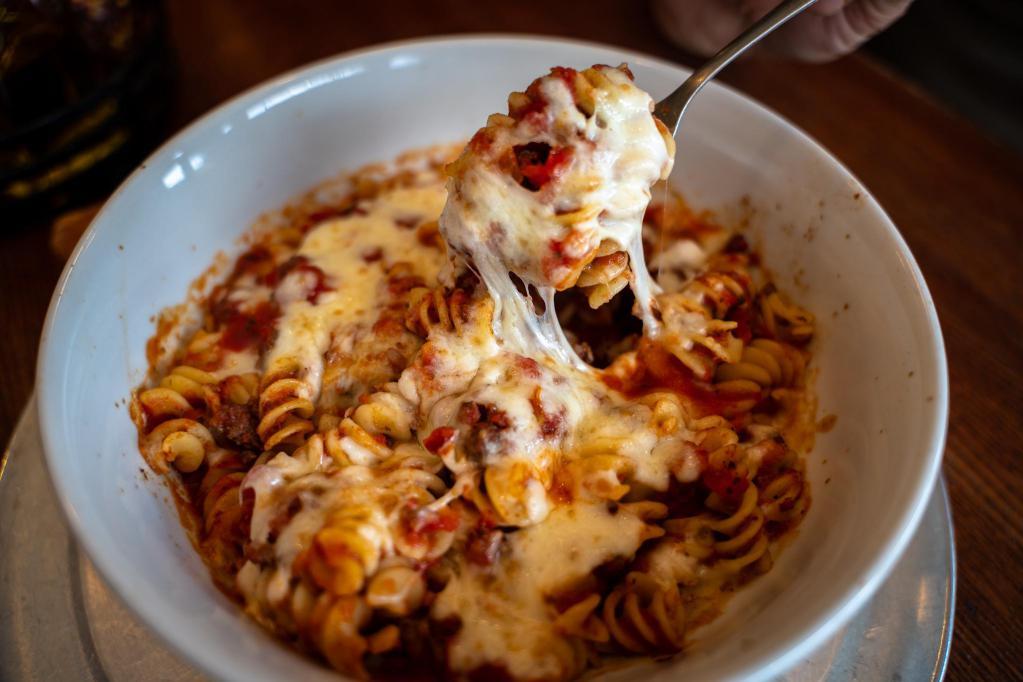 Baked Fusilli · Marinara and meat sauce served over fusilli with mozzarella cheese.