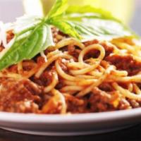 Spaghetti and Meat Sauce · Meat sauce served over spaghetti.