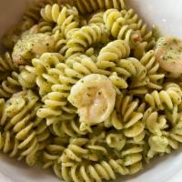 Pesto Pasta · Fusilli tossed in a creamy pesto sauce. Add protein for an additional charge.