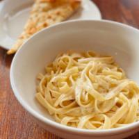 Fettuccine Alfredo · Creamy Parmesan sauce over fettuccine. Add chicken or shrimp for an additional charge.