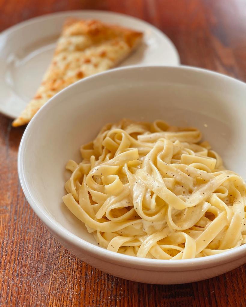 Fettuccine Alfredo · Creamy Parmesan sauce over fettuccine. Add chicken or shrimp for an additional charge.
