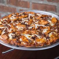 BBQ Chicken Pizza · Our unique barbecue blended pizza sauce, marinated chicken, onions and bacon.