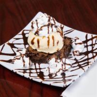 Delicious Chocolate Brownies · Served with chocolate chips.