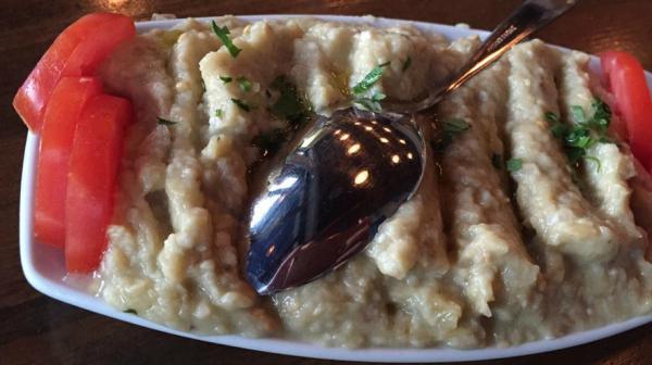 Baba Ghanoush · Char-grilled smoked eggplant puree flavored with tahini, garlic, olive oil and lemon juice.
