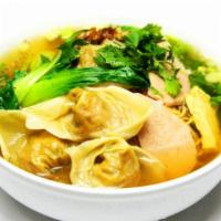Wonton Noodle · Tasty wonton with vegan protein over wheat noodle, served with bok choy and fresh herbs.