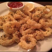 Fried Calamari · Breaded and fried to absolute perfection, served with made-from-scratch marinara and lemon.