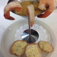 Shrimp Martini · Jumbo Texas-Gulf shrimp sauteed with olive oil, garlic, lemon, parsley and finished with a P...