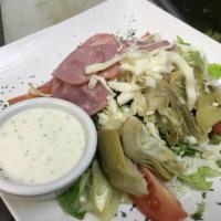 Artichoke Salad · Green leaf lettuce, mozzarella cheese, black olives, tomato, pepperoncini, Canadian bacon an...