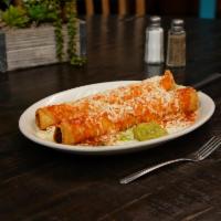 Beef or Chicken Flautas Cocina Special · Two flautas, chicken or beef, wrapped in a flour tortilla, deep-fried and drenched in tangy ...