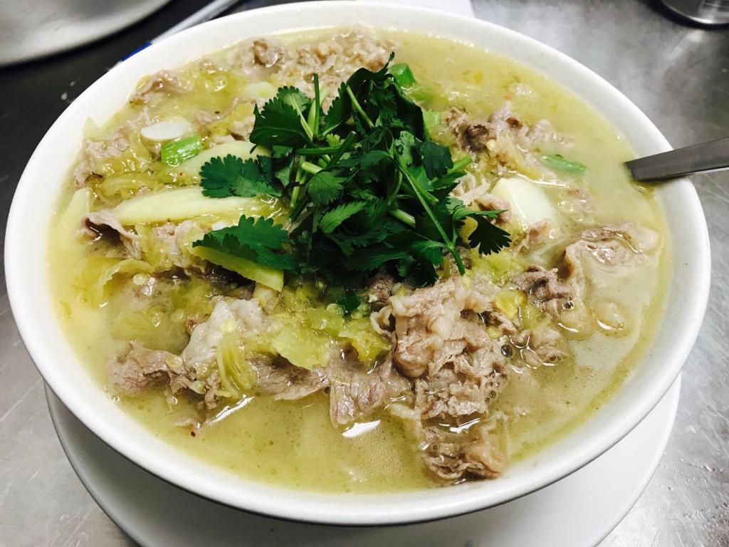 H11. Sliced Beef with Special Sour Soup · Spicy.