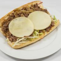 Cheesesteak Sub · Comes with grilled onions, lettuce, tomatoes, mayo, cheese and hot peppers. Add toppings for...
