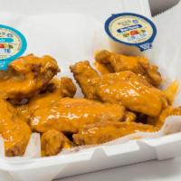 Jumbo Party Wings · Served with choice of style and dressing. Add extra dressing and flavor for an additional ch...