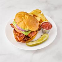 Crispy Chicken Sandwich · Breaded chicken, avocado, bacon, lettuce, tomato, and chipotle mayo. Served with french fries.