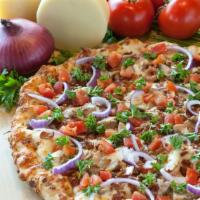 Chicken Bacon Ranch Pizza · Chicken breast, bacon, red onions, fresh tomatoes cheese and white sauce.