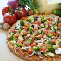 California Veggie Pizza · Mushrooms, onions, tomatoes, broccoli, zucchini, spices and white sauce.