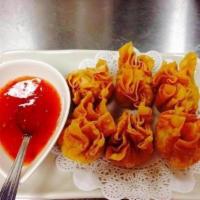 4. Crab Rangoon · 6 pieces. Crab meat and cream cheese wrapped in wonton skins and crispy fried to golden brow...
