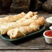 Extremely Twisted Sticks · Freshly baked dough“twisted”
with a blend of Swiss and Fontina cheeses, pureed garlic and or...